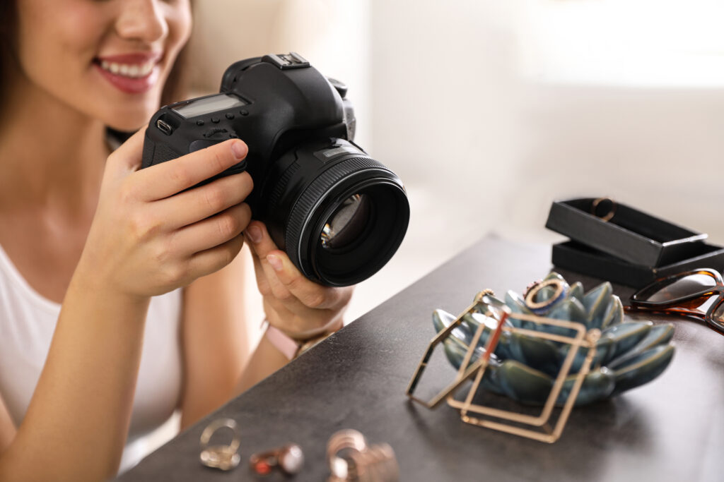 photographer-taking-photos-of-arranged-jewelry